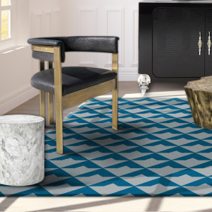 blue and grey rug with chair